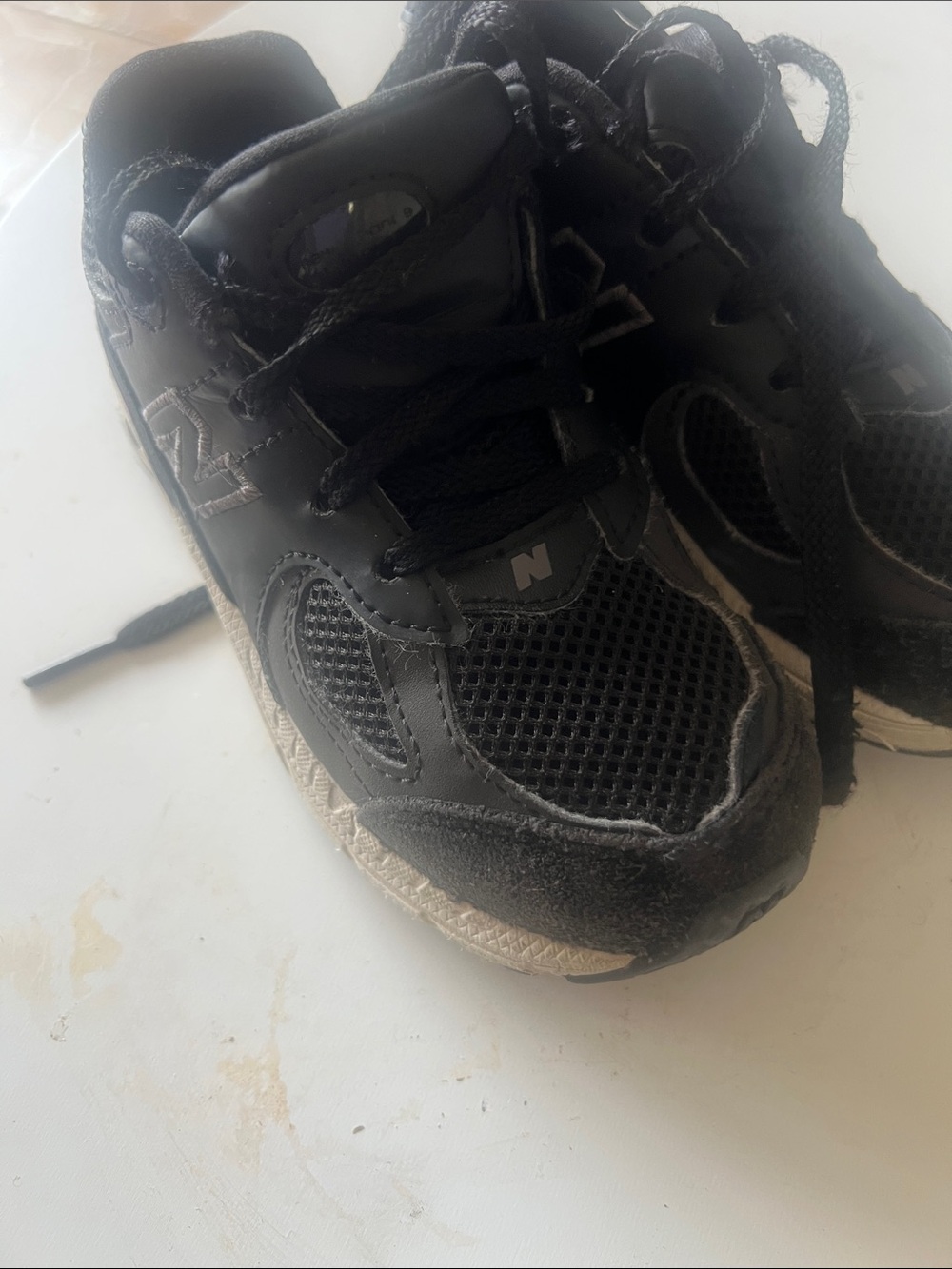 New Balance Kids Black and Gray Athletic Sneakers